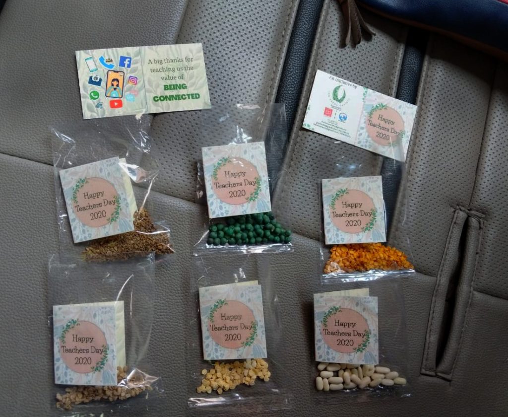 Seed sachets containing seeds of different varieties including carrot, beans, chillies, tomatoes, ladies finger, capsicum etc. 