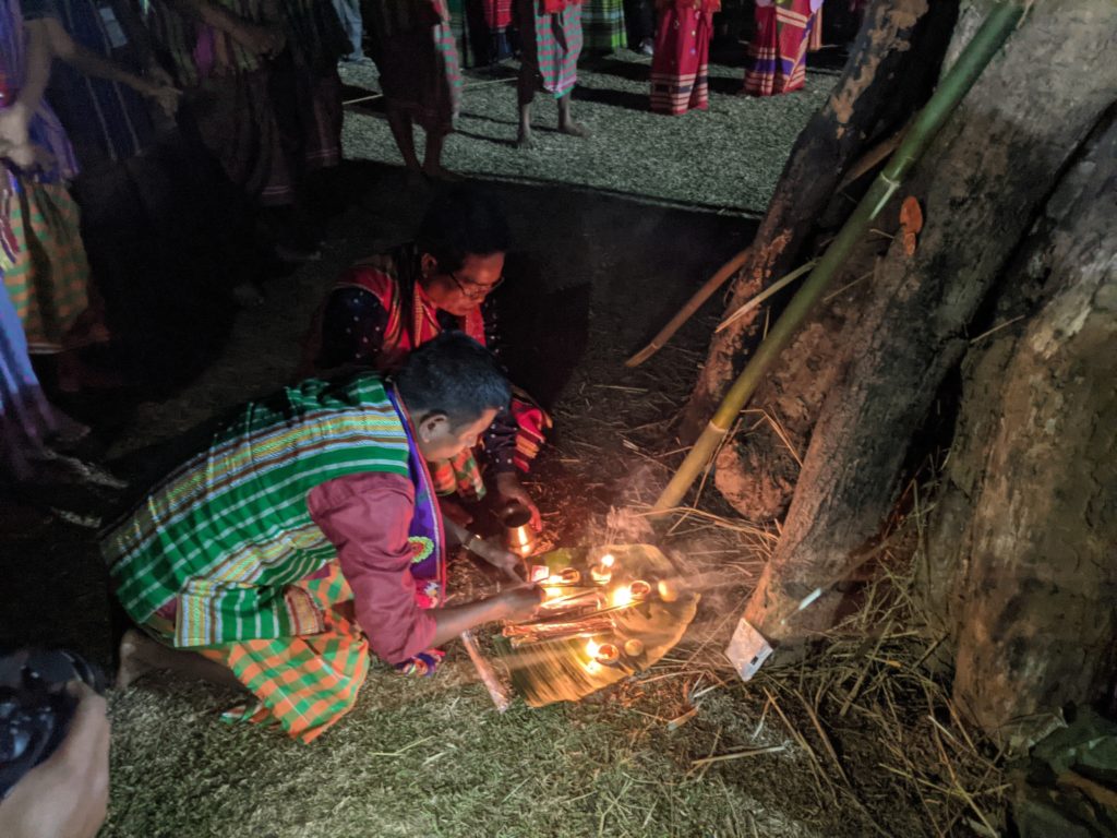 Earthen lamps lighted to offer prayers